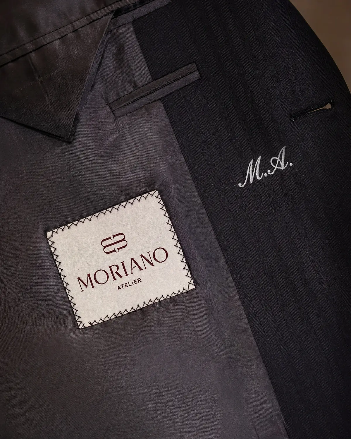 Inside a MORIANO jacket: the lining, the label and a monogram